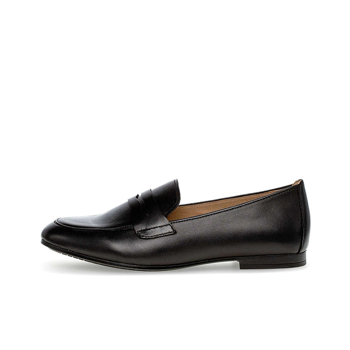 Black leather loafer side view with stitched strap detail and low heel