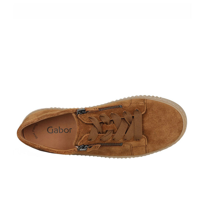 Brown suede sneaker with lace-up front, side zip, and cushioned collar.