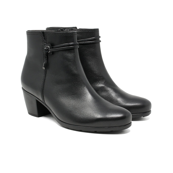 Black leather heeled ankle boots with side zipper and decorative strap