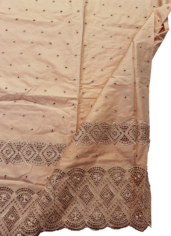 A yard of gold Swiss Voile lace with a floral pattern and scalloped edges.