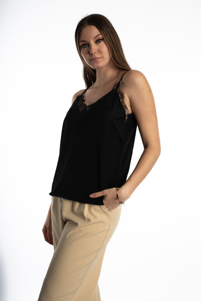 Model wearing the Hallie Lace Tank Top in Carbon black with floral lace trim and spaghetti straps.