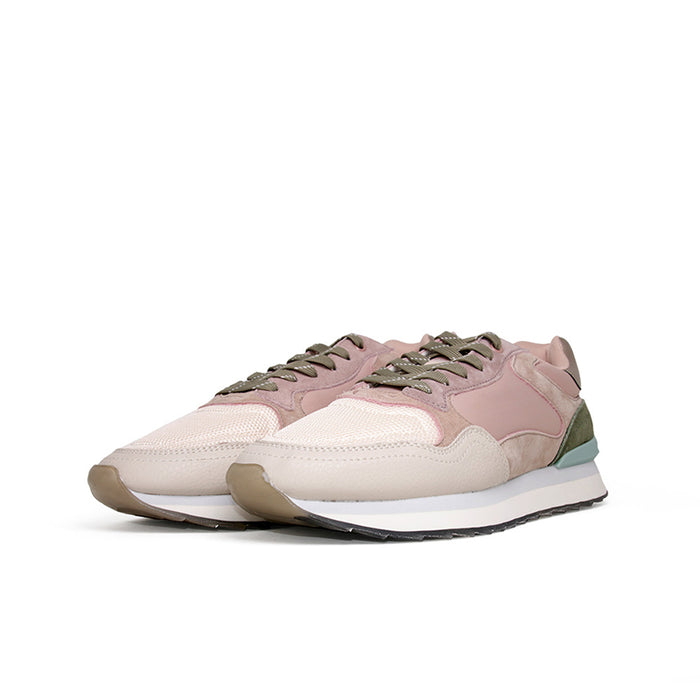Women’s leather sneakers with pink panels, white toe, and green sole trim