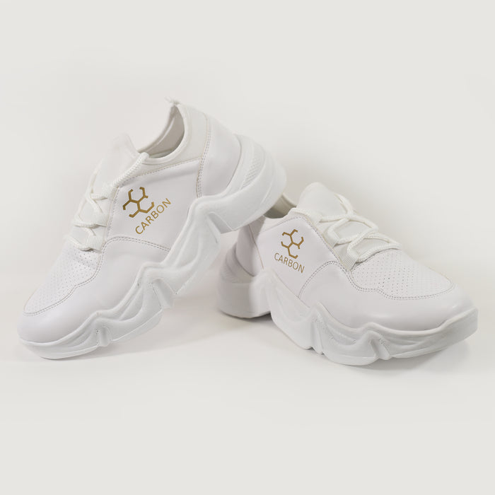 Ice Chunky Platform Sneakers by Carbon in white with gold logo and wavy streetwear thick soles.