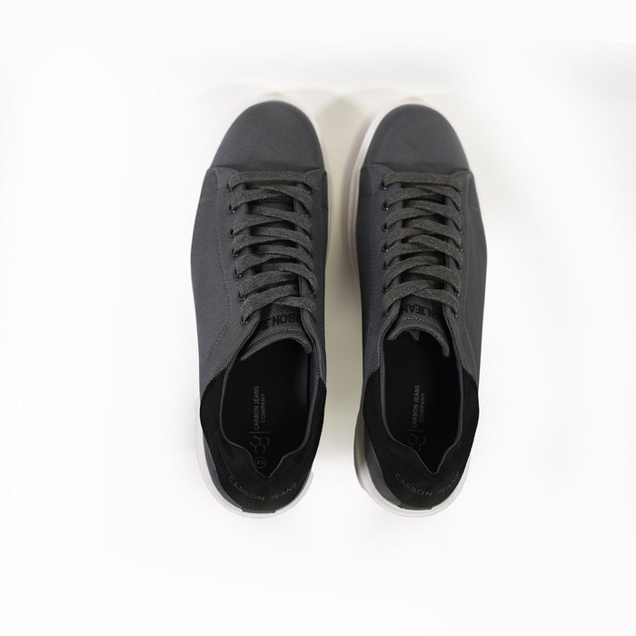 Top view of Johnny Grey Urban Streetwear Sneakers in Carbon with black heel detail, grey laces, and white soles.