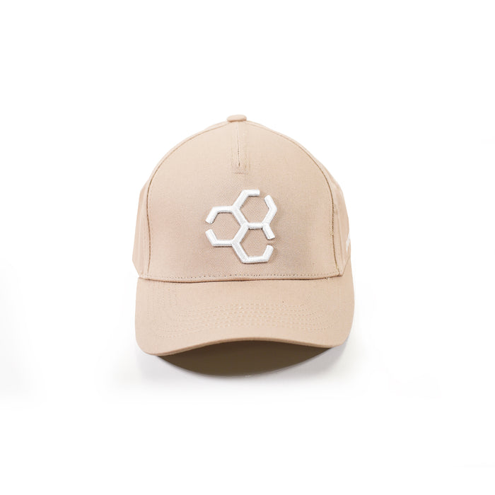 Tan Carbon streetwear baseball cap featuring a white embroidered hexagonal logo centered on a white background.