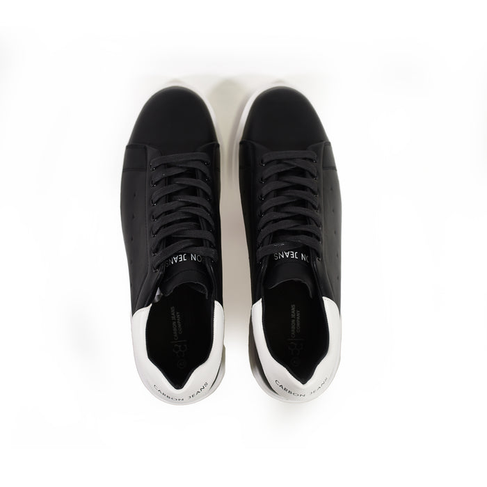 Top view of black Urban Signature Logo Sneakers with white heel accents, lace-up front, and Carbon Jeans branding.