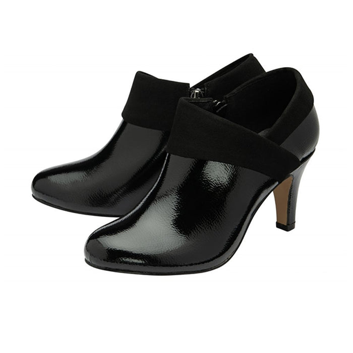 Women's black leather ankle boot with glossy finish, side strap, and block heel