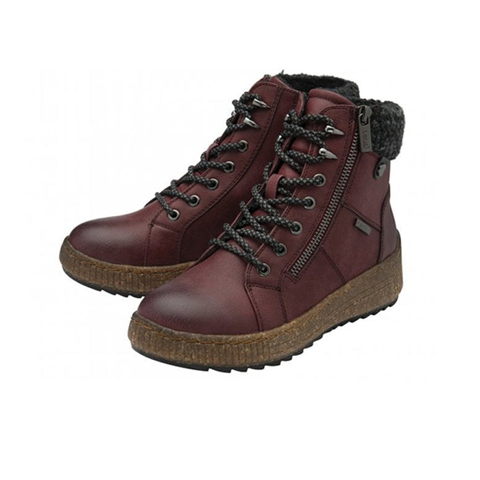 Burgundy lace-up ankle boots with side zip, faux-fur collar, and chunky tread sole