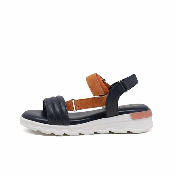 Women's blue leather sandals with tan strap detail and hook-and-loop closure, white sole
