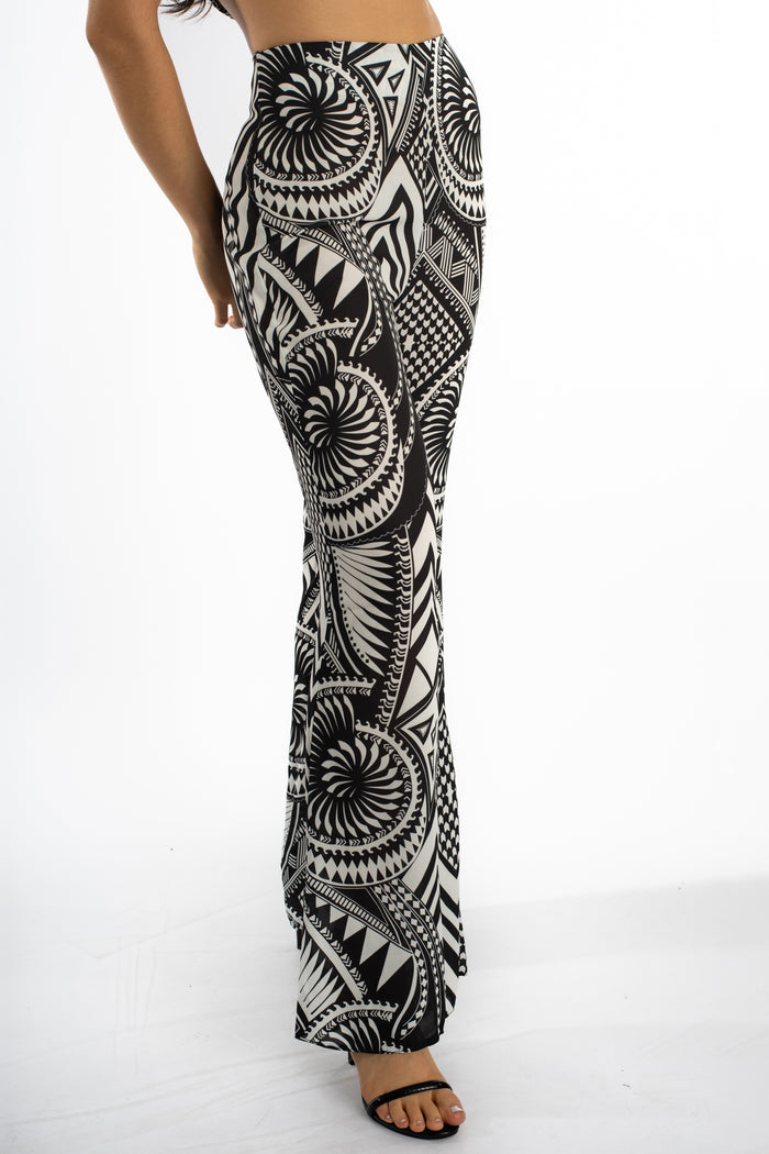 Marlee high-waisted wide leg pants with black and white tribal geometric print and a flowy bohemian fit.