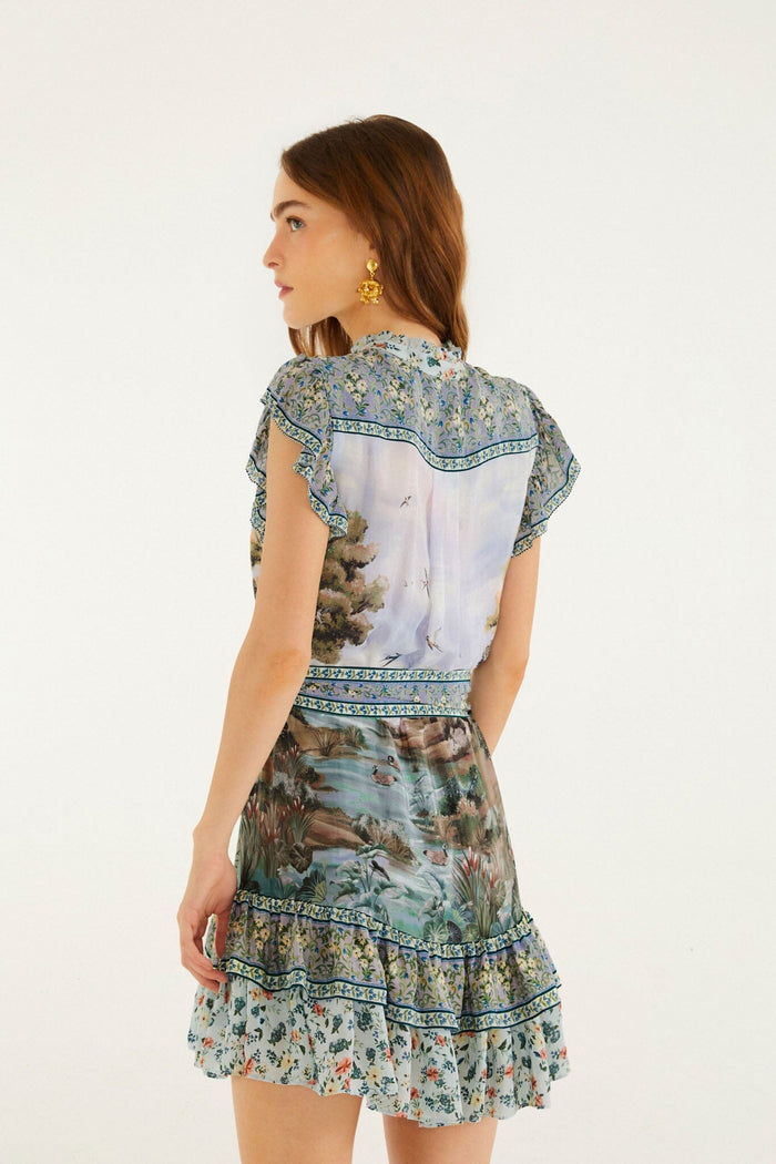 FARM Rio model wearing the Multicolor Countryside Landscape Belted Ruffled Mini Dress