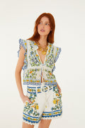 FARM Rio model wearing the Off-White Emily Floral Tapestry Belted Shorts