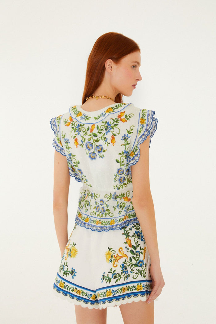 FARM Rio model wearing the Off-White Emily Floral Tapestry Belted Shorts