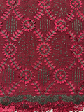 Red African lace fabric