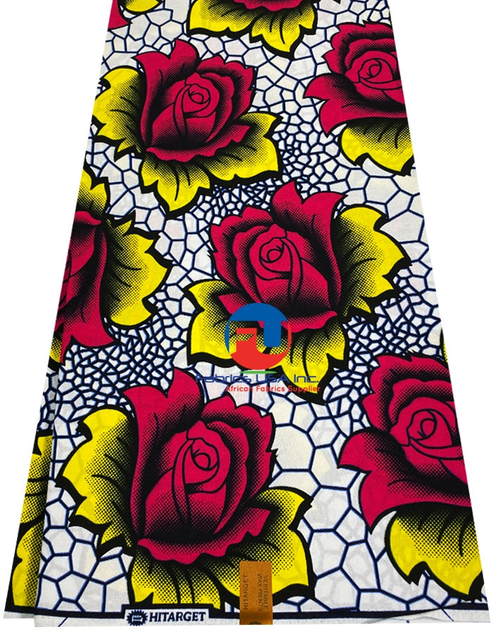 African wax print fabric featuring a vibrant pattern with geometric shapes and floral designs, predominantly in red, yellow, and blue colors on a white background.