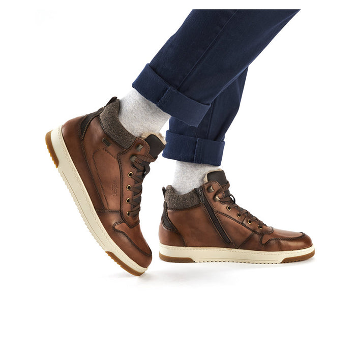 Men’s brown lace-up ankle boots with padded collar and off-white sole