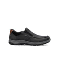 Black men's slip-on sneaker with padded collar and treaded rubber sole