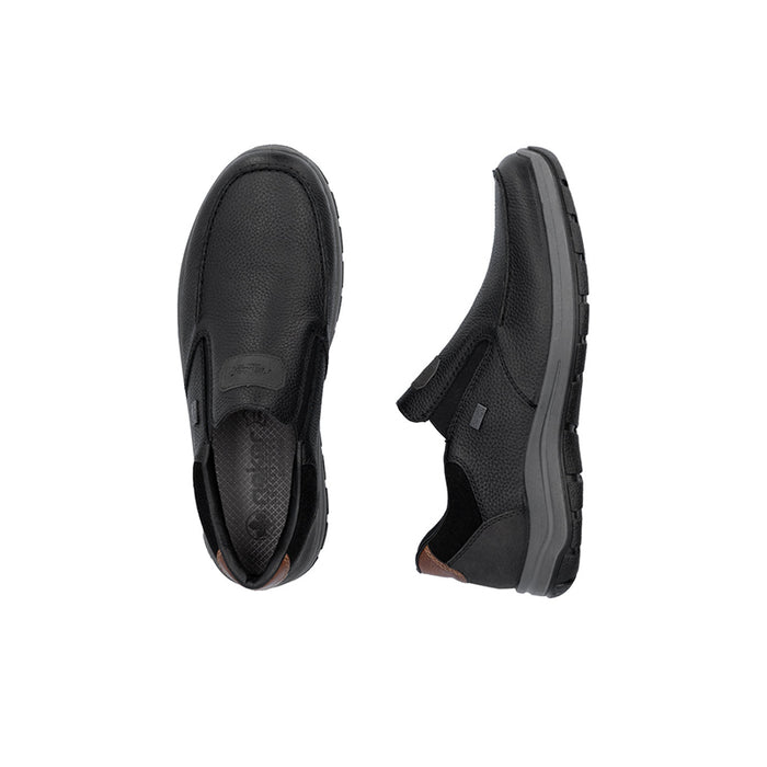 Black men's slip-on sneaker side view with elastic gore and thick rubber sole
