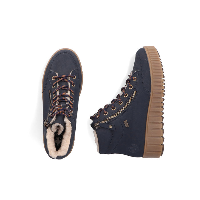 Blue ankle boots with lace-up front, side zipper, and tan treaded sole