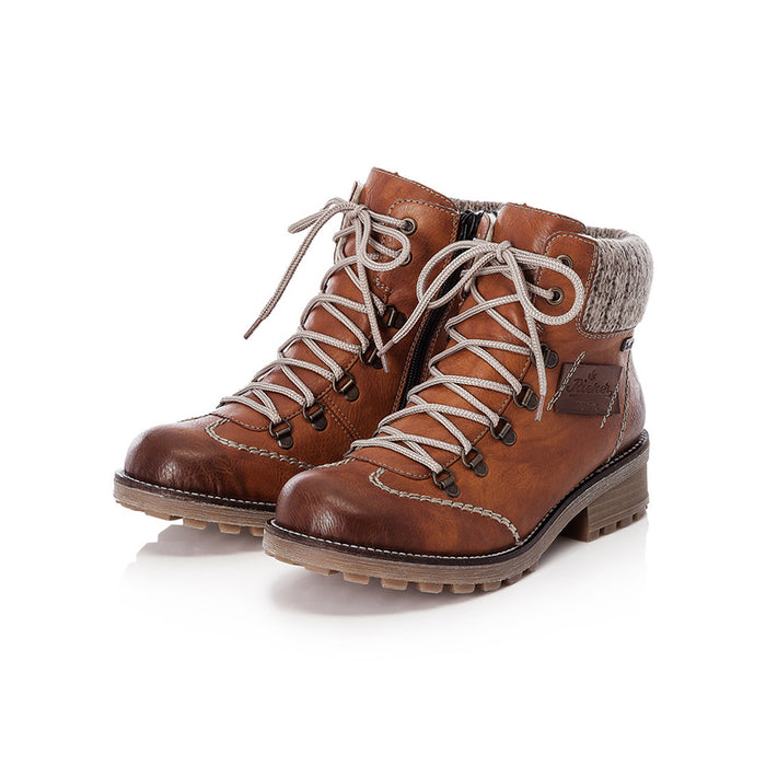 Pair of Rieker brown lace-up ankle boots with gray knit cuffs and chunky tread soles