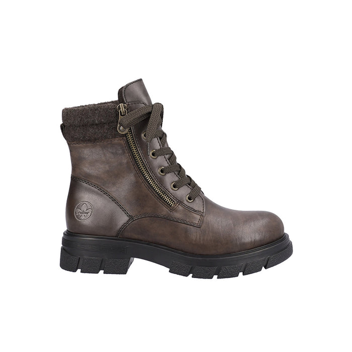 Brown mid-calf winter boot with lace-up and side zipper, rugged tread sole