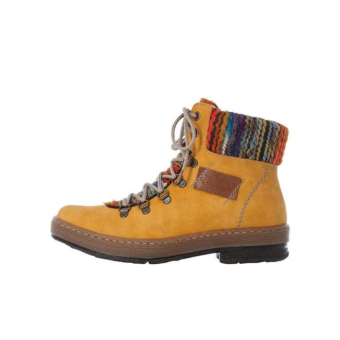 Brown suede ankle boots with multicolor knit cuff and lace-up front