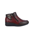 Dark red leather ankle boots with side zipper and padded ankle collar