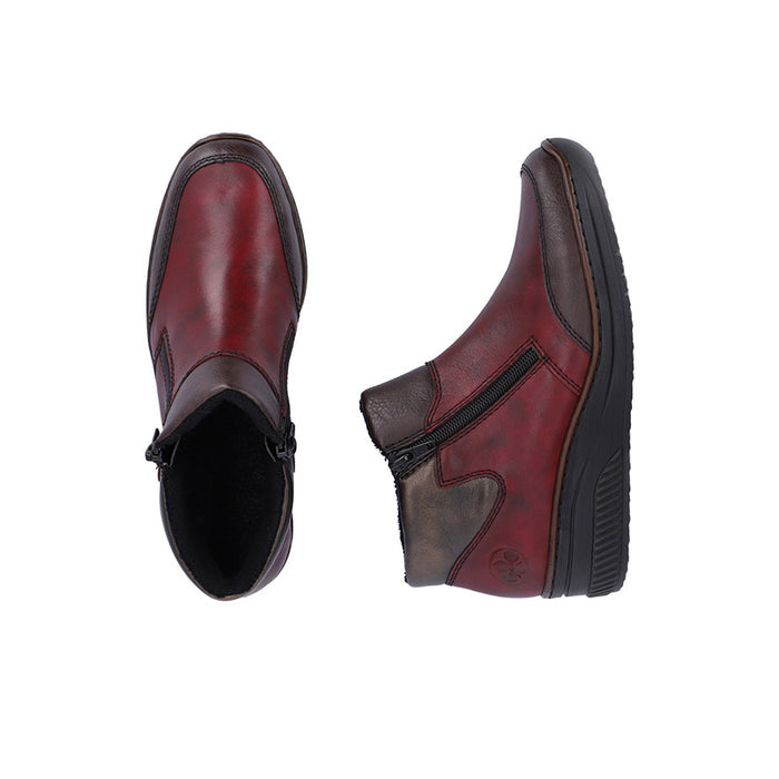 Dark red leather ankle boots pair, showing side zipper and open toe view