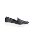 Dark blue leather-look slip-on loafers with white sole and strap detail