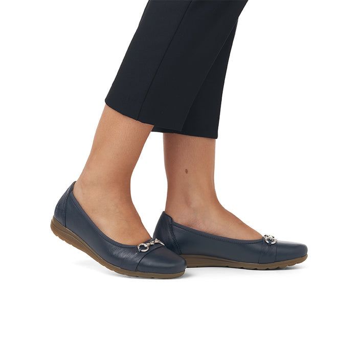Navy slip-on flat pumps with decorative metal buckle