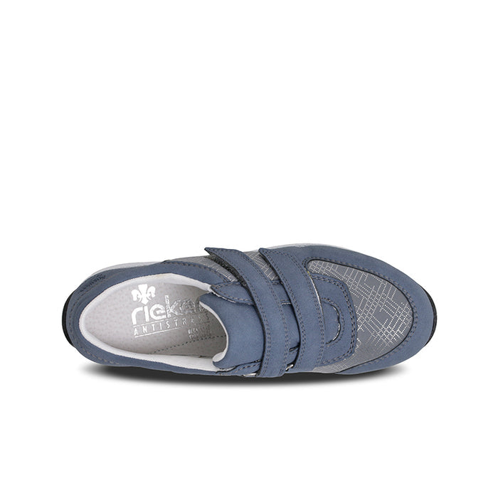 Blue sneaker interior view with hook-and-loop straps and padded collar