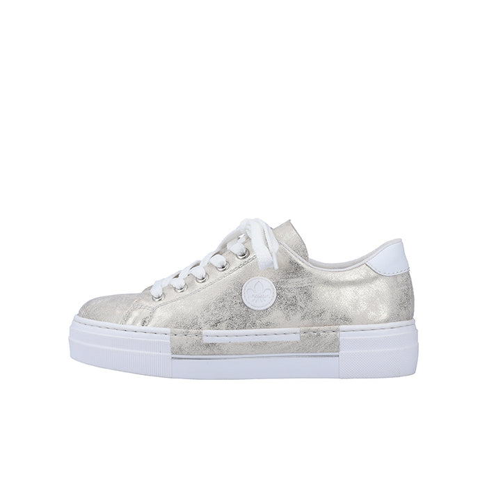 Rieker women's silver sneaker, side view, lace-up with circular logo