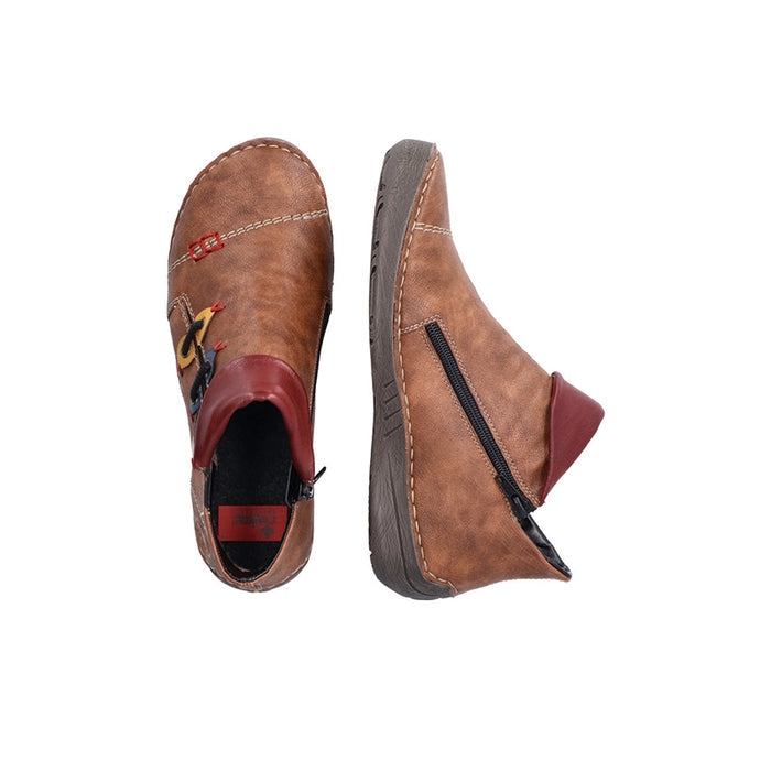 Pair of brown sneakers showing side zipper and cushioned heel