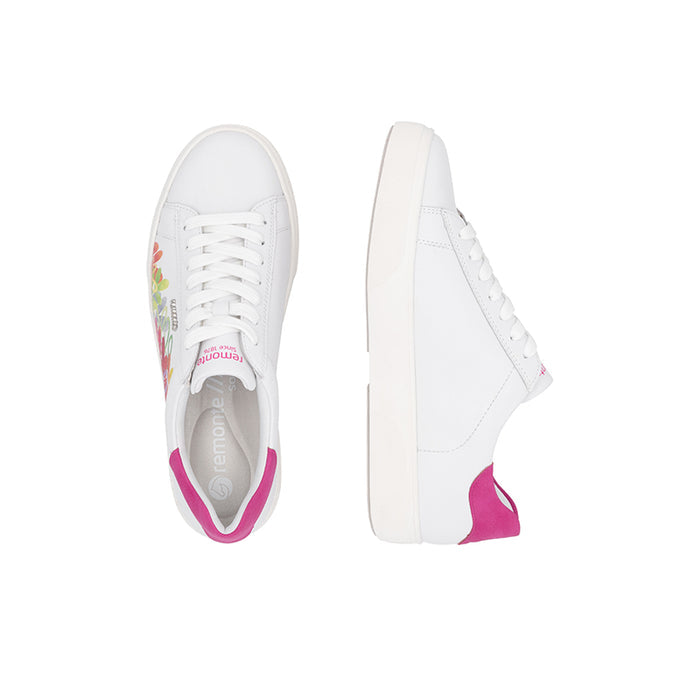White lace-up sneaker pair view with multicolor floral detail and magenta heel trim.