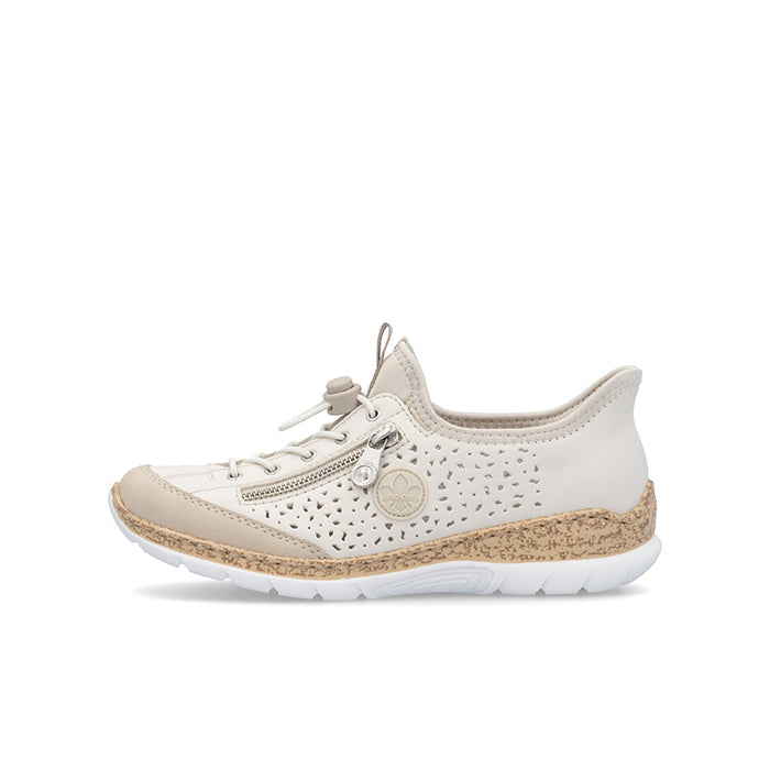 Beige lace-up sneaker with perforated sides, round logo badge, textured tan sole.
