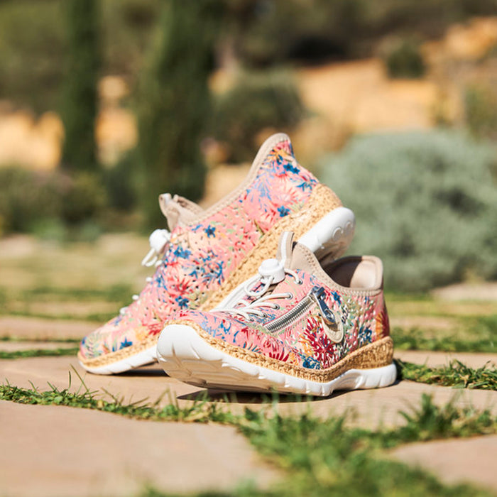 Multicolor knit lace-up sneaker with cork-look midsole and thick white outsole.