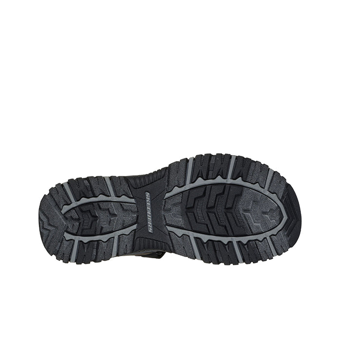 Men's black sandal outsole with deep tread and rugged traction pattern