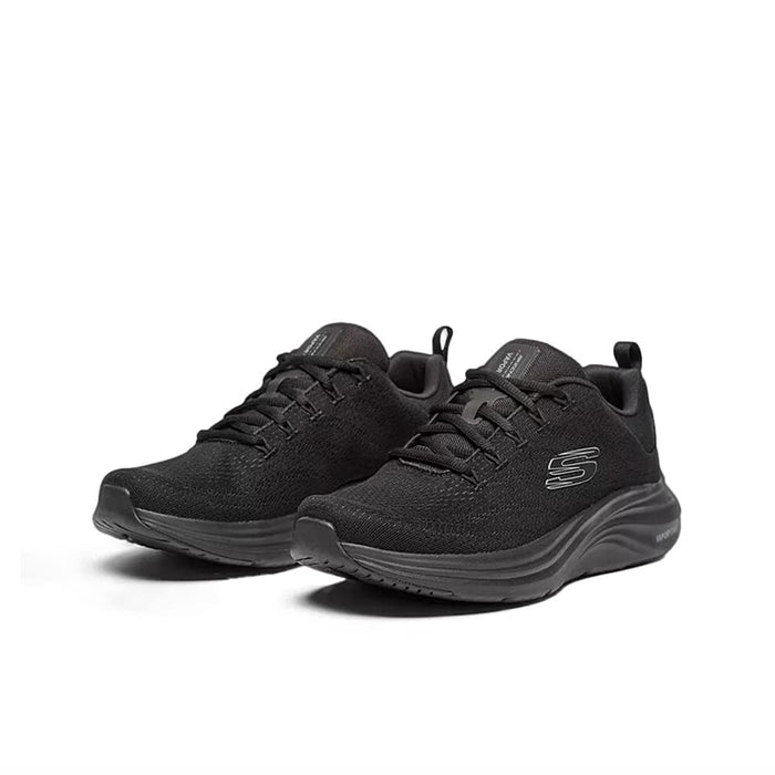 Men's black lace-up sneakers with textured upper and cushioned midsole