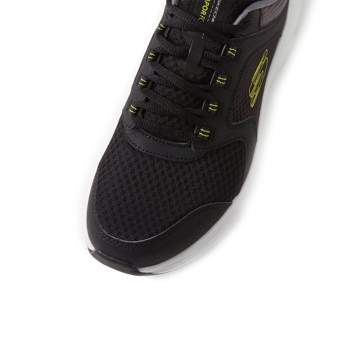 Black mesh men’s sneaker with black laces and neon lime eyelet accents