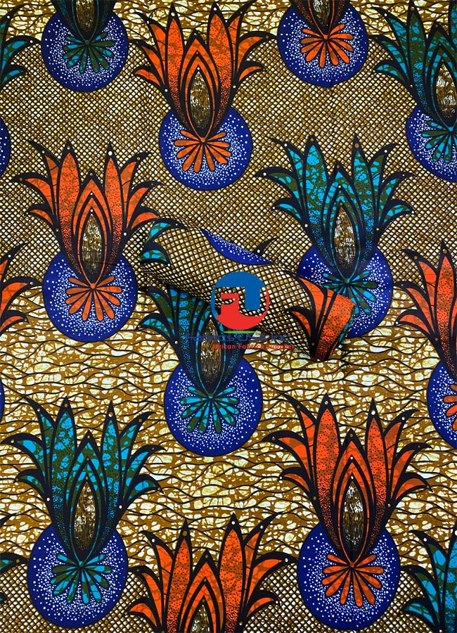 A vibrant ankara wax print fabric featuring geometric patterns in orange, teal-green, blue, black, white, and peanut-brown colors on a gold background.