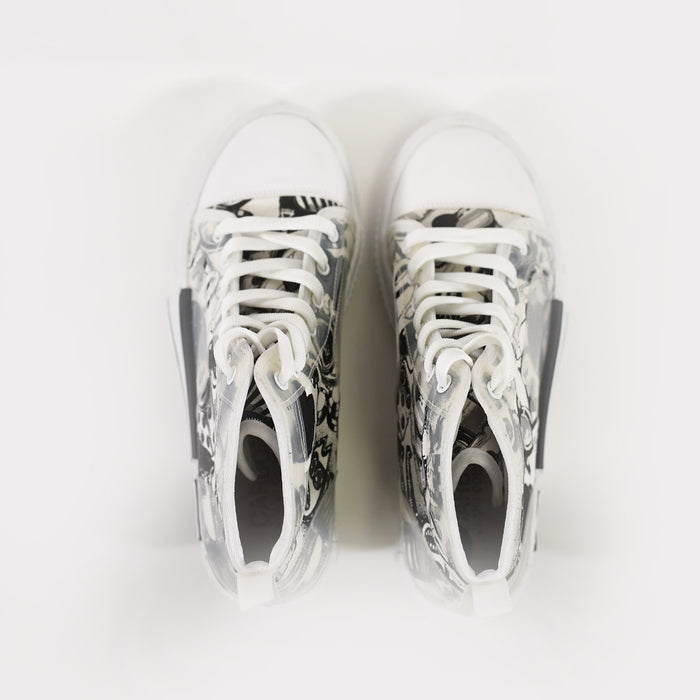 Top view of Star Mid-Top Streetwear Sneakers in Carbon, featuring urban graphic patterns and white laces.