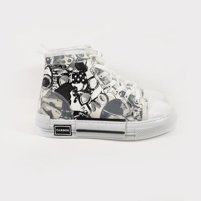 White Carbon Star mid-top streetwear sneakers with black graffiti-style graphics, star motif, and white rubber sole.