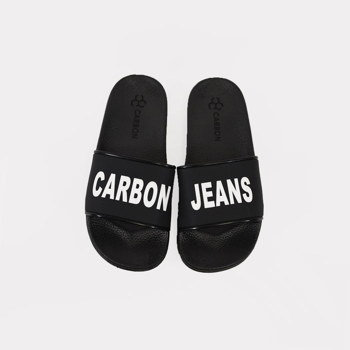Black Carbon Jeans platform flip flops with bold white logo text on straps and textured footbeds for beach and summer wear.