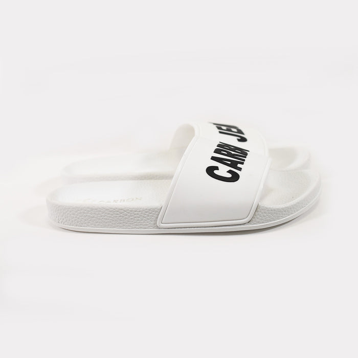 White platform flip flops with black Carbon Jeans logo, textured non-slip beach slides for summer by Carbon.