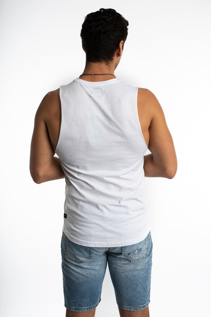 Back view of Carbon Summer Rain white tank top, a slim fit streetwear essential paired with denim shorts.