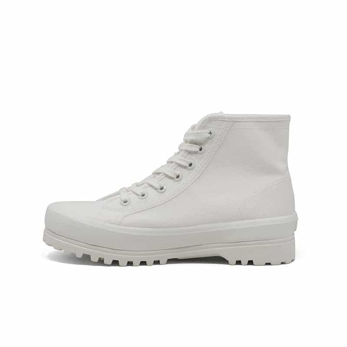 White women's lace-up ankle boot with side eyelets and rubber lug sole