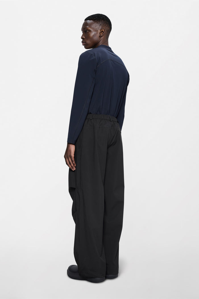 RAINS Suva Hardshell Pants Wide Black Pants