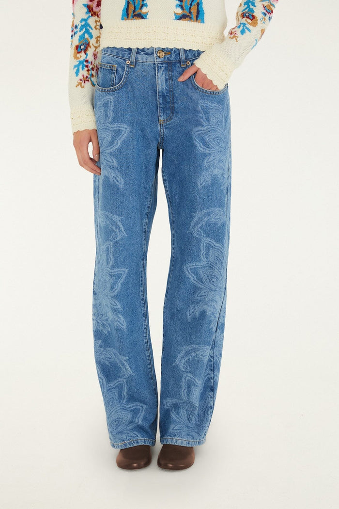 FARM Rio model wearing the Tapestry Dream Laser Denim Trousers