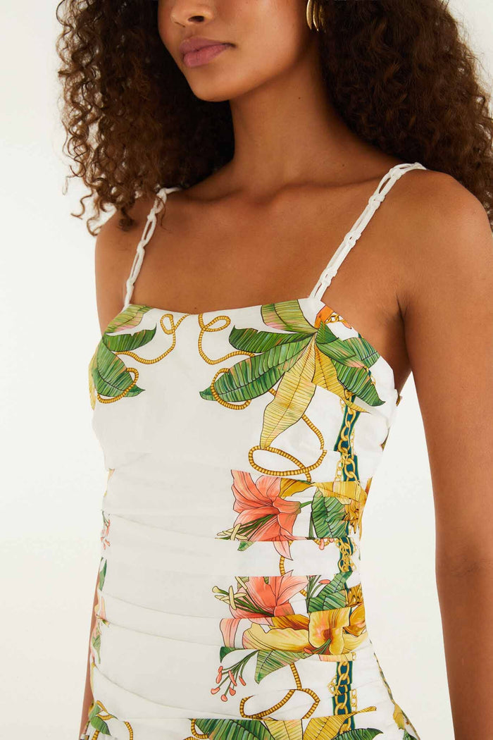 FARM Rio model wearing the Tropical Royalty Off-White Midi Dress Sleeveless