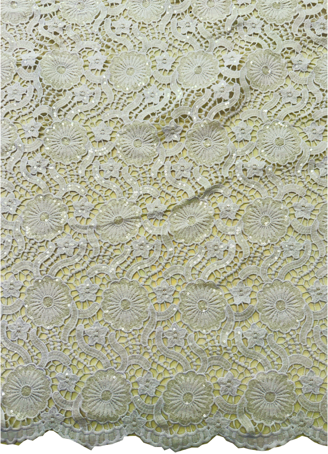 A piece of white African guipure lace fabric with sequins, featuring floral corded embroidery detailing.